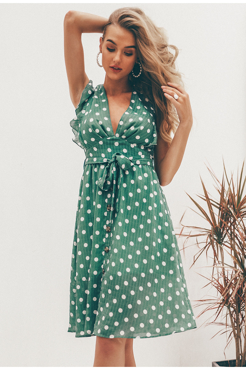 GRÜNES POLKA-DOT-KLEID MIT V-AUSSCHNITT