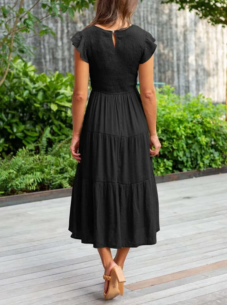 Raffiniertes bauchbedeckendes Kleid