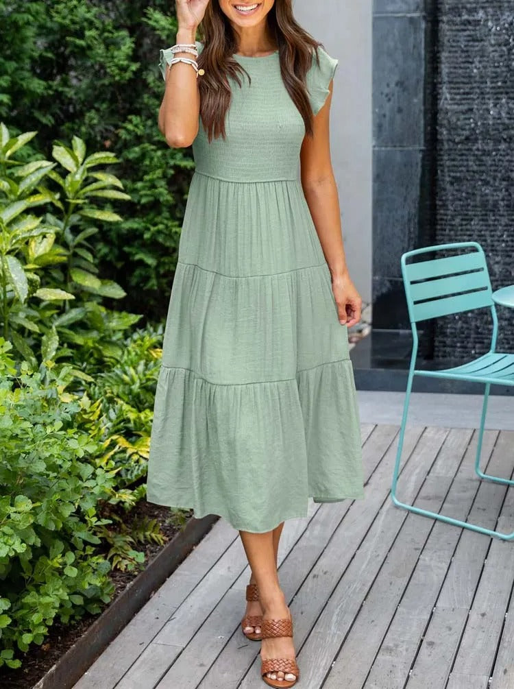Raffiniertes bauchbedeckendes Kleid