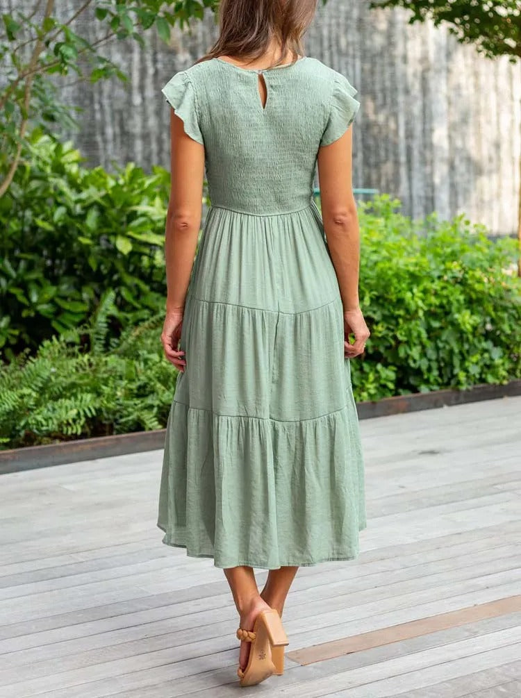 Raffiniertes bauchbedeckendes Kleid
