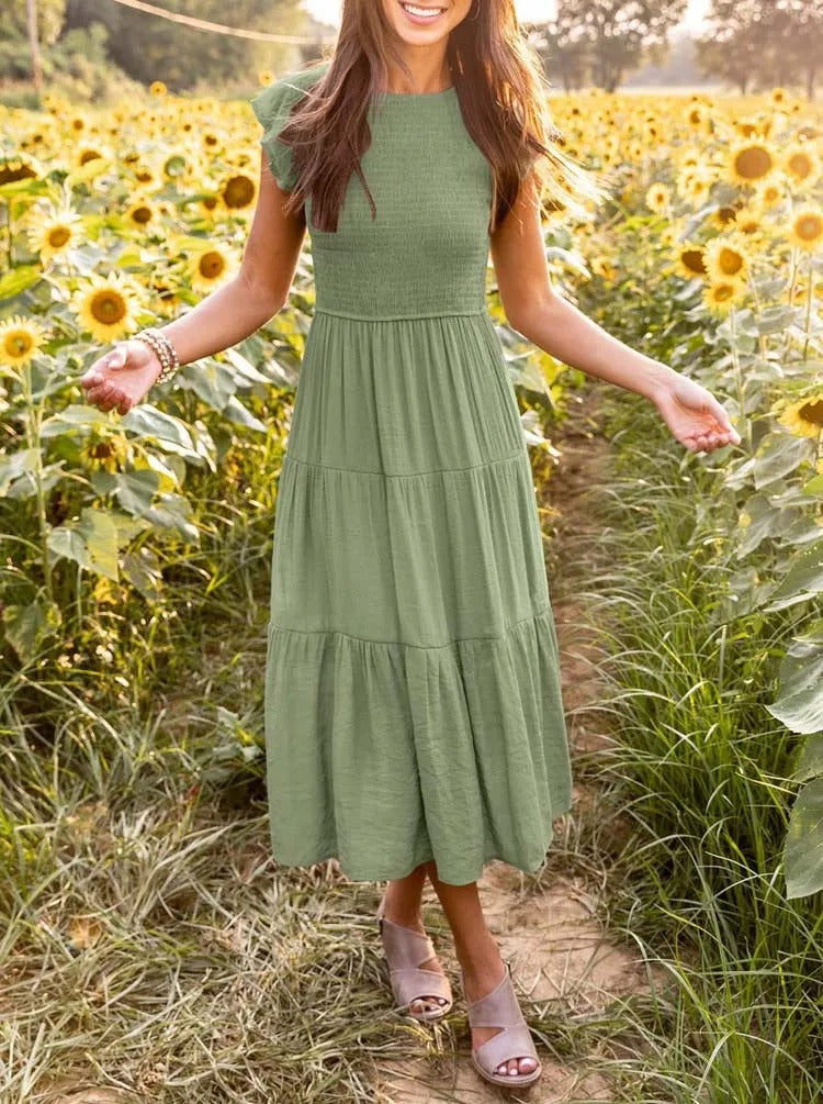 Raffiniertes bauchbedeckendes Kleid