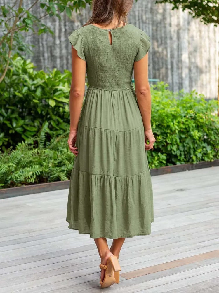 Raffiniertes bauchbedeckendes Kleid