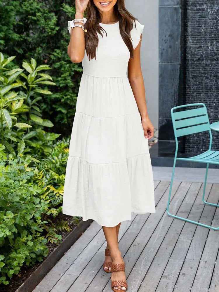 Raffiniertes bauchbedeckendes Kleid