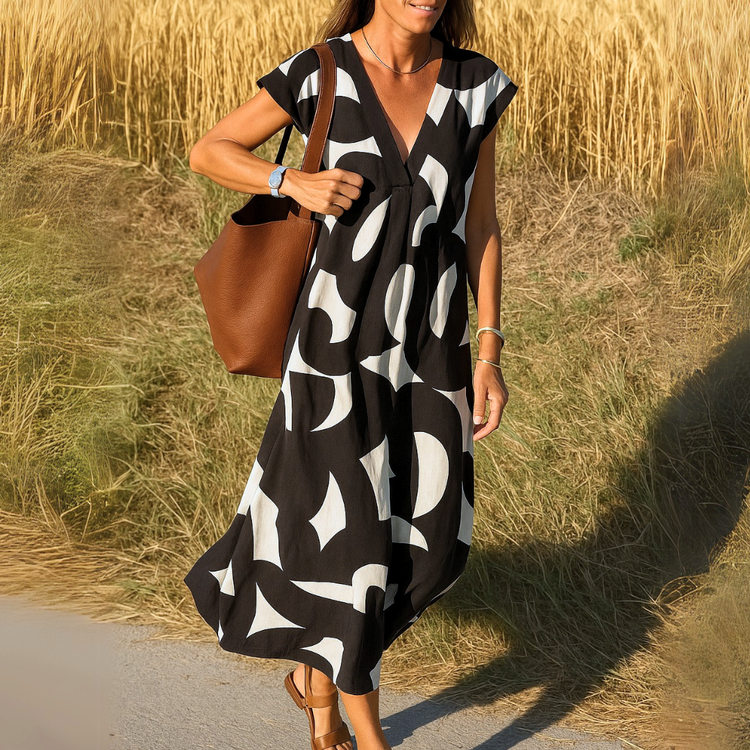 V Ausschnitt Kleid Damen | Grafischer Print & Femininer A-Linie-Schnitt