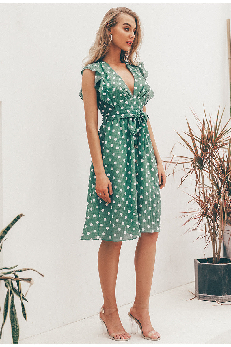 GRÜNES POLKA-DOT-KLEID MIT V-AUSSCHNITT