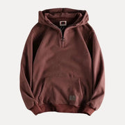 Men's hoodie with half-zip, relaxed fit, and ribbed cuffs