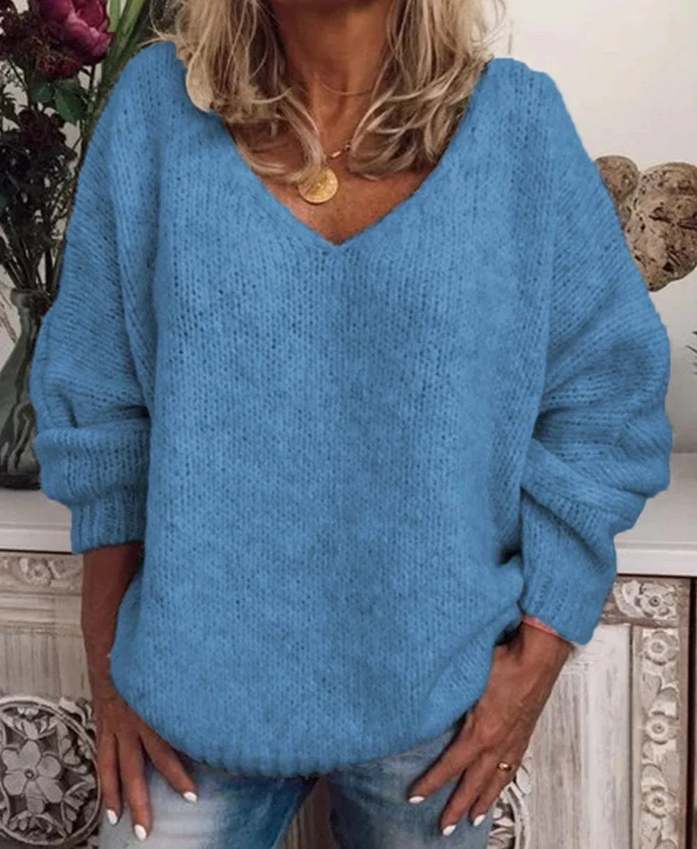 Langärmeliger lakonischer Pullover