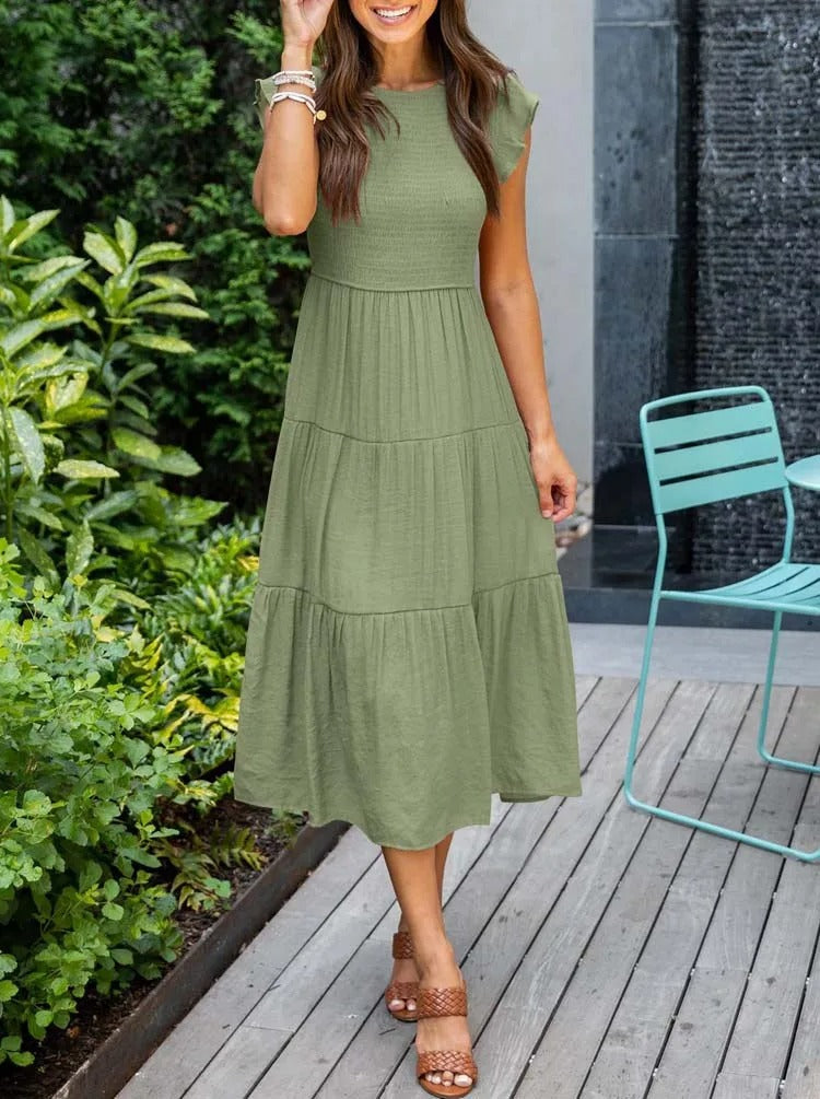 Raffiniertes bauchbedeckendes Kleid