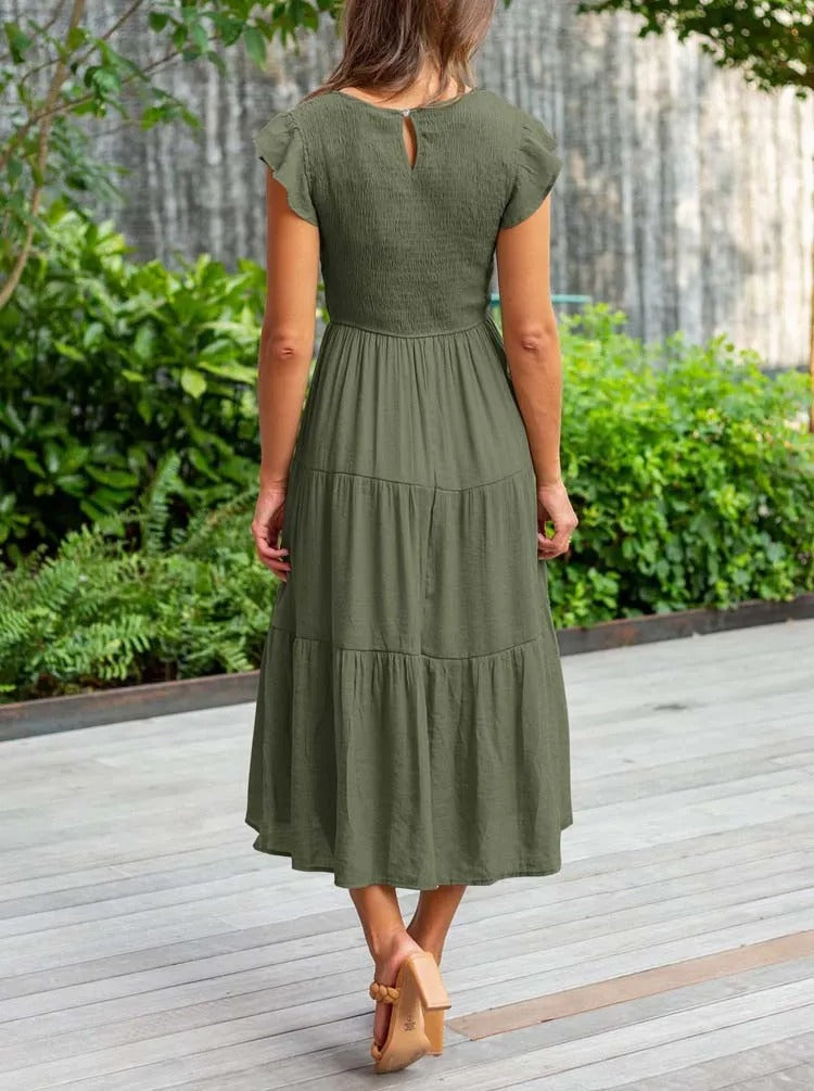 Raffiniertes bauchbedeckendes Kleid