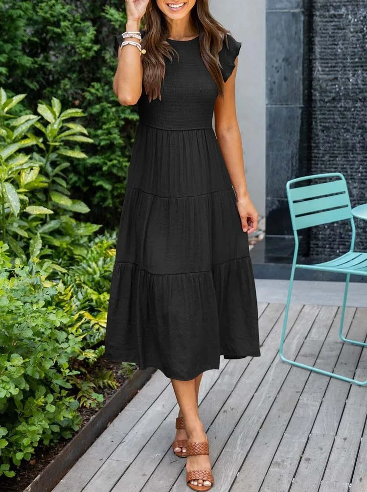 Raffiniertes bauchbedeckendes Kleid