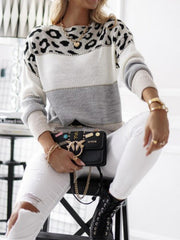 Knitted sweater with round neckline
